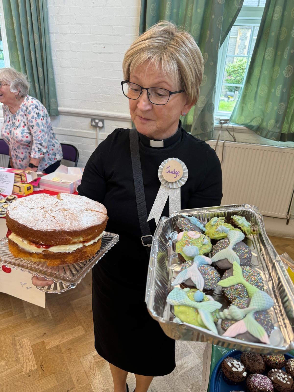 Barbara with the winning cakes from the junior bake off